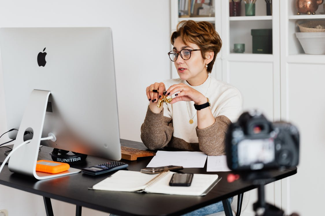A business consultant hosting a webinar 